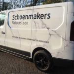 Autoreclame marmer car-wrap met belettering